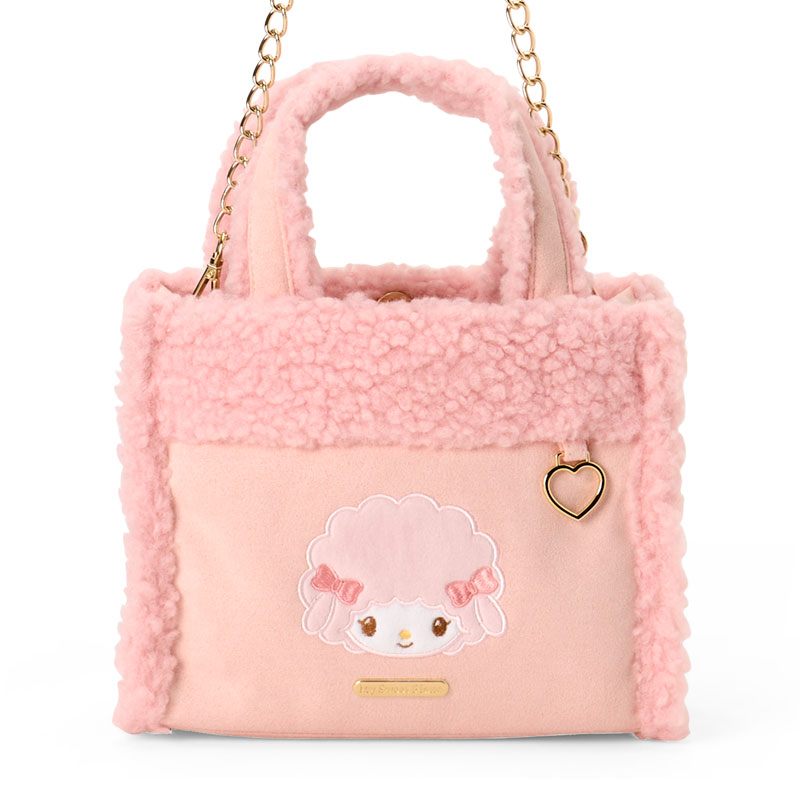 正面の接写。ピアノの顔、左右のリボン、ボアの縁取り、ハート形金具を確認できます。 画像:サンリオ公式楽天店。